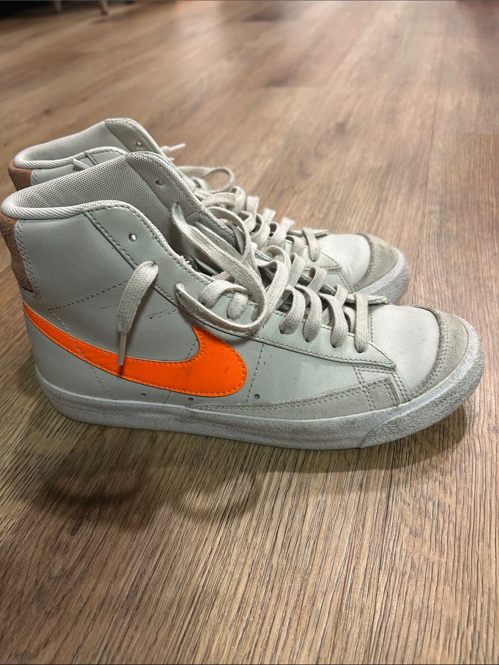 Nike High-Top Sneakers in Light Gray with Bright Orange Swoosh